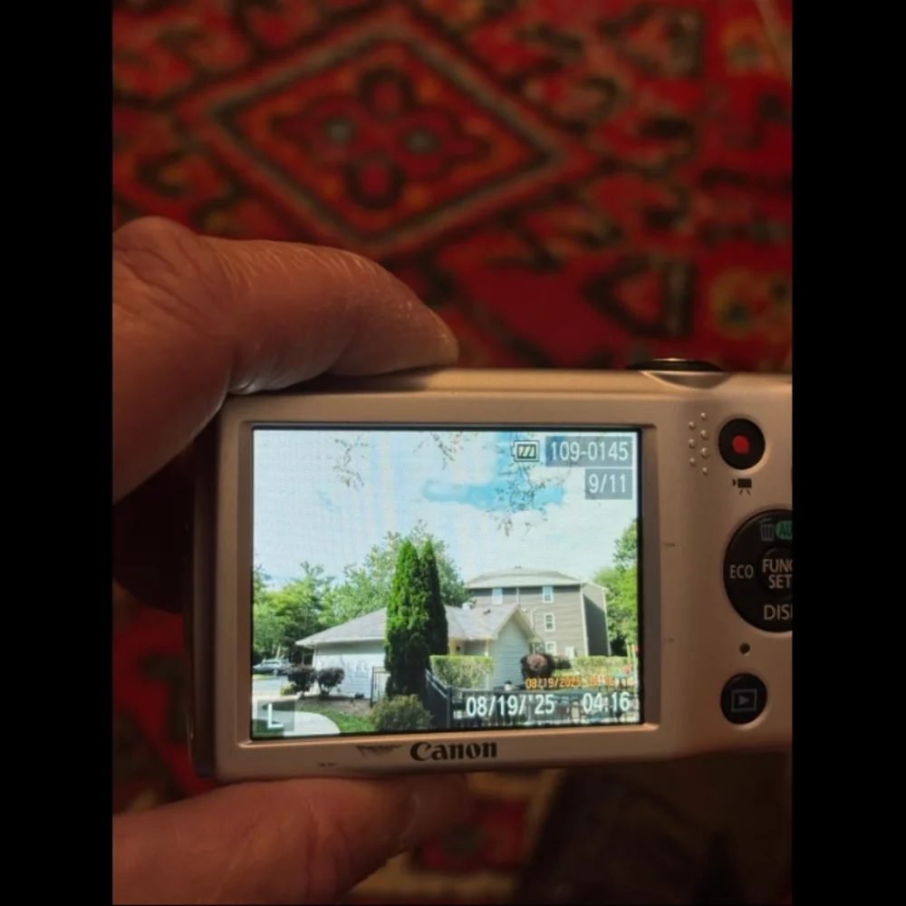 Canon Silver Digital Camera with Black Case